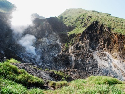 Volcanic steam rising from Xiaoyoukeng 