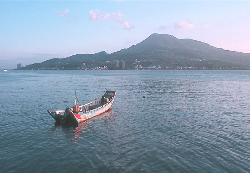 A view of Kuanyin Mountain from the Tamsui River