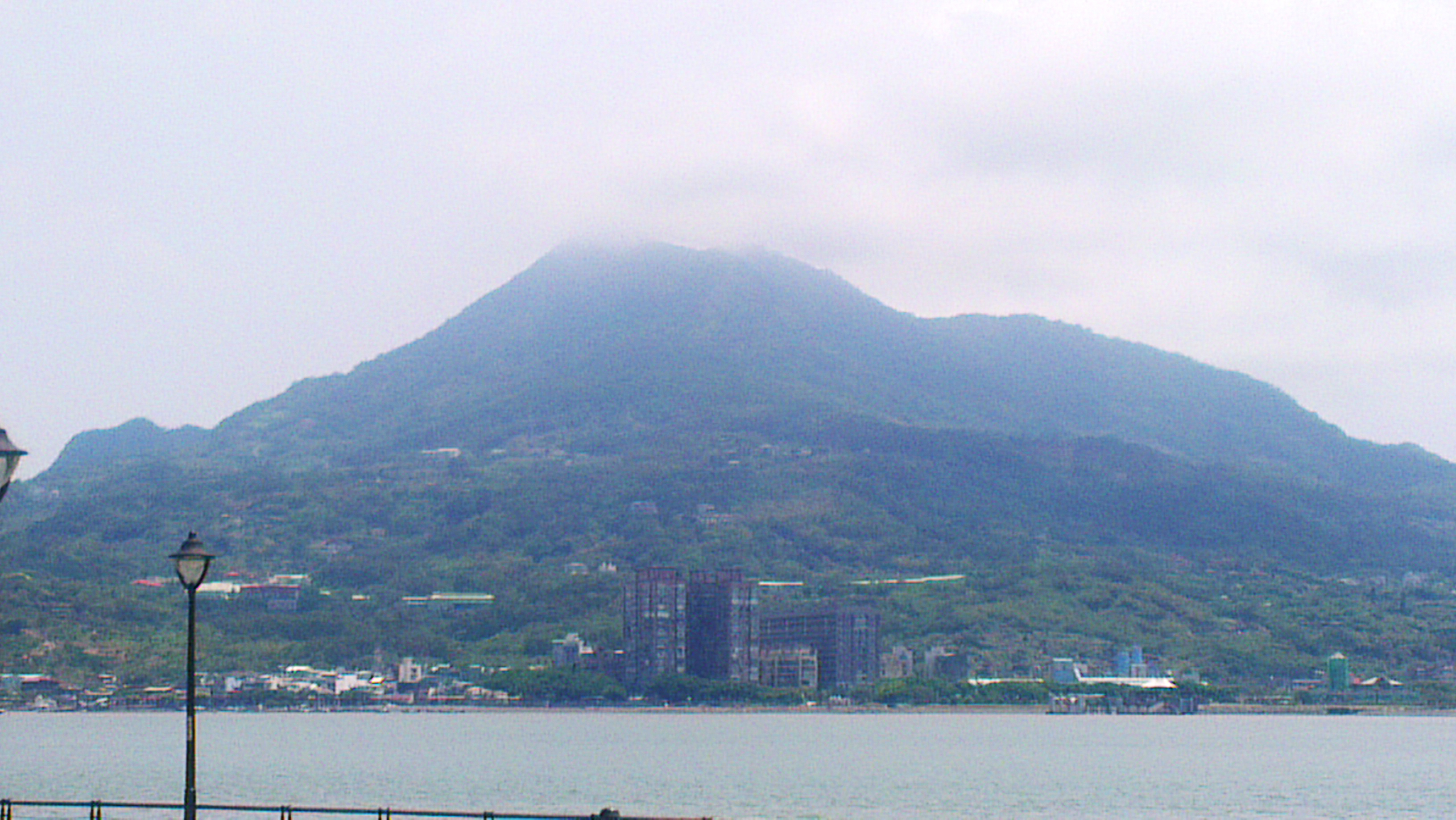 A view of Kuanyin Mountain from the Tamsui River